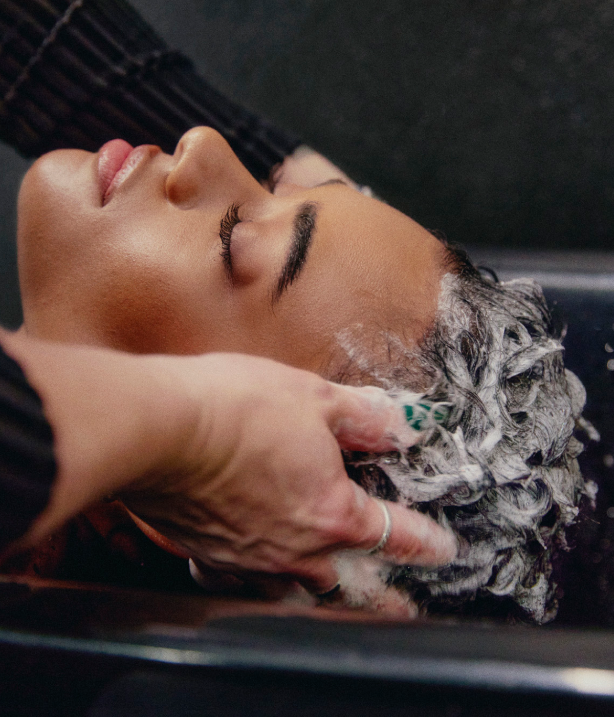 Model Getting Her hair Washed