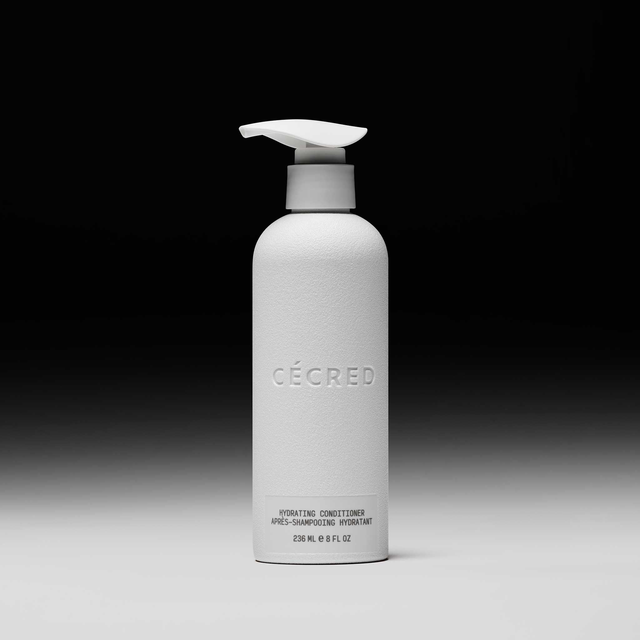 Cécred Hydrating Conditioner 236ml pump bottle displayed upright against a gradient black-to-white background