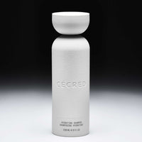 Cécred Hydrating Shampoo bottle displayed upright on a gradient black-to-white background.